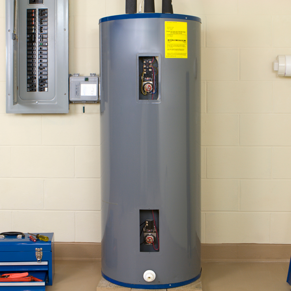 New gray tank water heater in the basement of a house; tool box on floor nearby.
